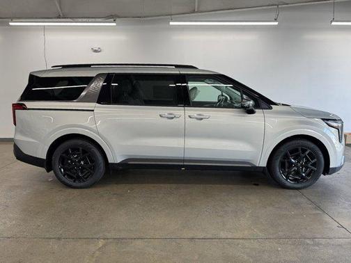 Ivory Silver 2026 Kia Carnival SX Prestige