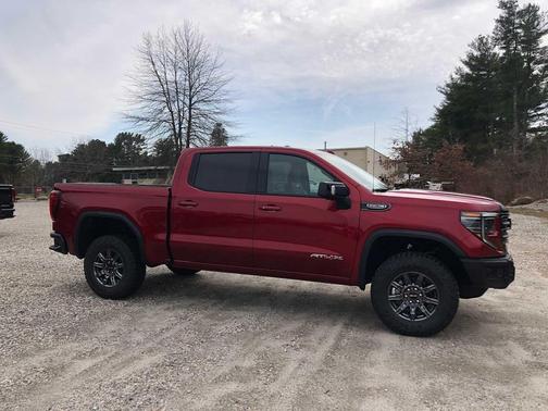 Volcanic Red Tintcoat 2026 GMC Sierra 1500 AT4X