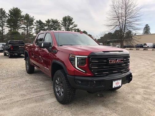 Volcanic Red Tintcoat 2026 GMC Sierra 1500 AT4X