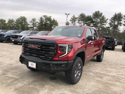 Volcanic Red Tintcoat 2026 GMC Sierra 1500 AT4X