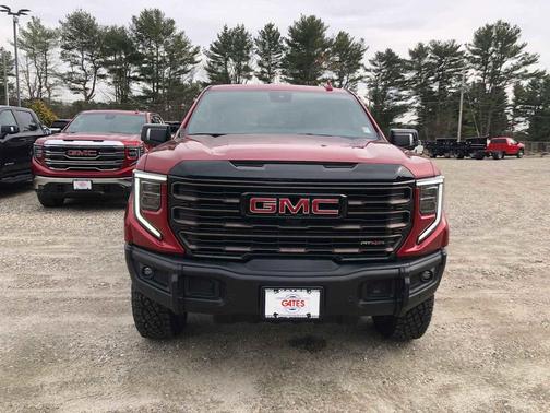 Volcanic Red Tintcoat 2026 GMC Sierra 1500 AT4X