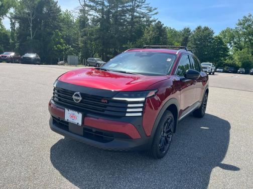 Scarlet Ember Tintcoat 2026 Nissan Kicks SR