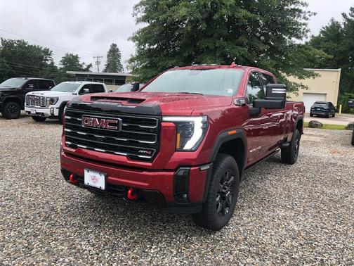 Volcanic Red Tintcoat 2026 GMC Sierra 3500 AT4