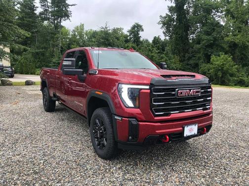 Volcanic Red Tintcoat 2026 GMC Sierra 3500 AT4