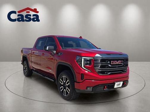 Volcanic Red Tintcoat 2024 GMC Sierra 1500 AT4