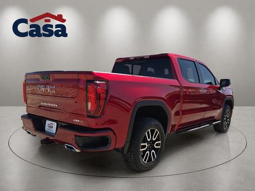 Volcanic Red Tintcoat 2024 GMC Sierra 1500 AT4