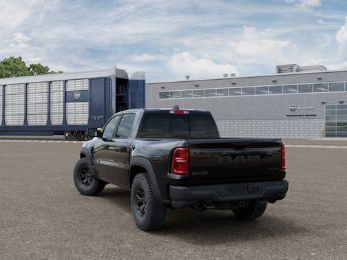 Diamond Black Crystal Pearlcoat 2026 RAM 1500 RHO Crew Cab 4x4 5'7' Box