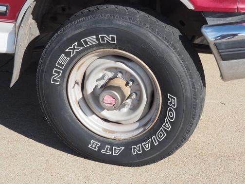 Red / White 1994 Ford F-250 XLT