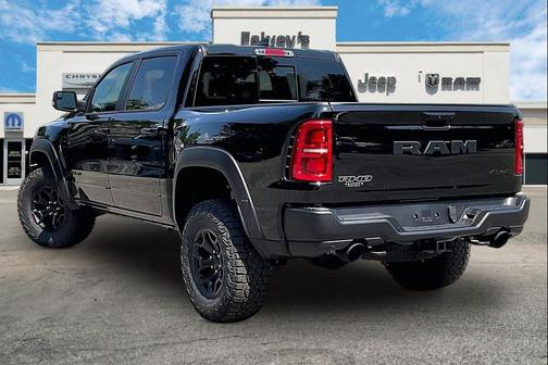 Diamond Black Crystal Pearlcoat 2026 RAM 1500 RHO Crew Cab 4x4 5'7' Box
