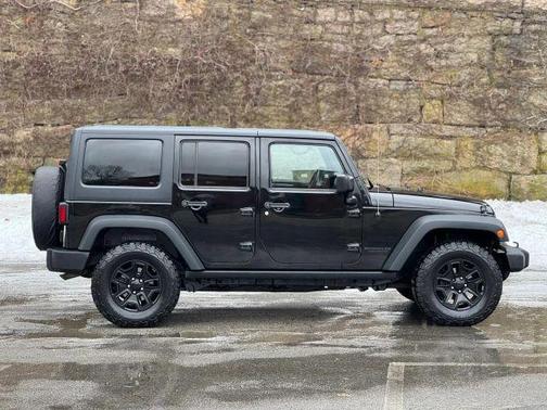 Black 2015 Jeep Wrangler Unlimited Sport