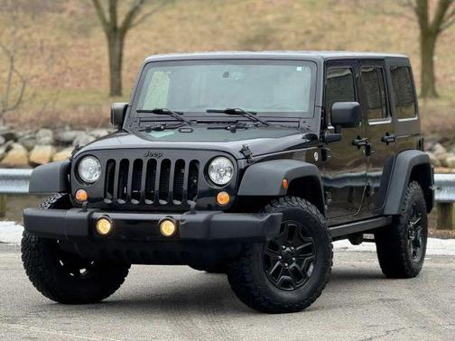 Black 2015 Jeep Wrangler Unlimited Sport