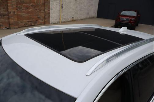 Crystal White Tricoat 2024 Cadillac XT4 Premium Luxury