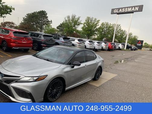 Midnight Black Metallic 2021 Toyota Camry Hybrid XSE