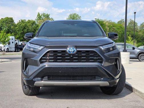 Silver Sky Metallic/Midnight Black Metallic 2023 Toyota RAV4 Hybrid SE