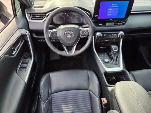 Silver Sky Metallic/Midnight Black Metallic 2023 Toyota RAV4 Hybrid SE