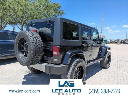 Black 2014 Jeep Wrangler Unlimited Sahara