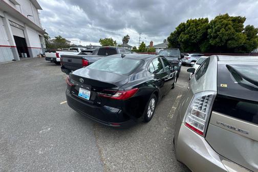 Midnight Black Metallic 2025 Toyota Camry LE