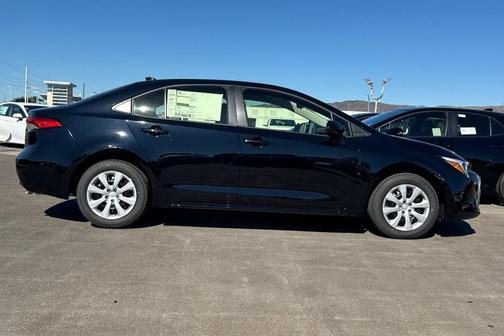 Midnight Black Metallic 2026 Toyota Corolla Hybrid LE