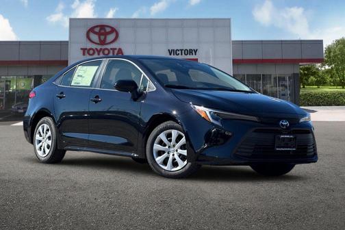 Midnight Black Metallic 2026 Toyota Corolla Hybrid LE