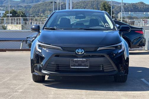 Midnight Black Metallic 2026 Toyota Corolla Hybrid LE