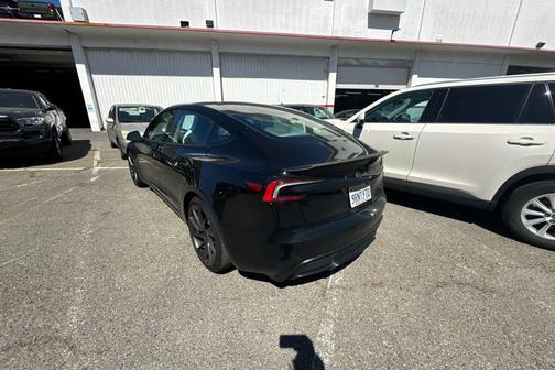 Solid Black 2024 Tesla Model 3 Performance