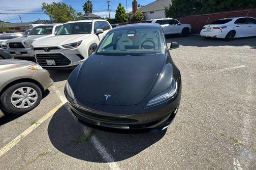 Solid Black 2024 Tesla Model 3 Performance
