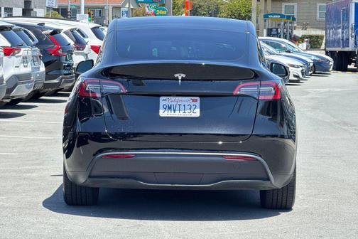 Solid Black 2024 Tesla Model Y Long Range Single Motor Rear-Wheel Drive