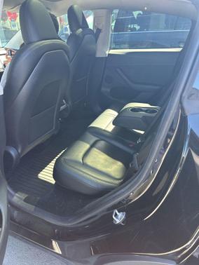 Solid Black 2024 Tesla Model Y Long Range Single Motor Rear-Wheel Drive