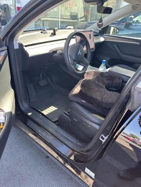 Solid Black 2024 Tesla Model Y Long Range Single Motor Rear-Wheel Drive