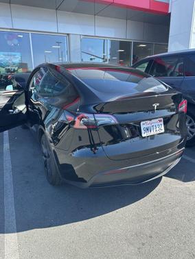 Solid Black 2024 Tesla Model Y Long Range Single Motor Rear-Wheel Drive