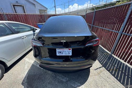 Solid Black 2024 Tesla Model Y Long Range Single Motor Rear-Wheel Drive