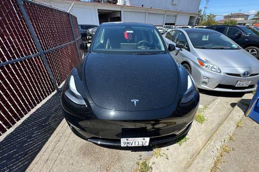 Solid Black 2024 Tesla Model Y Long Range Single Motor Rear-Wheel Drive