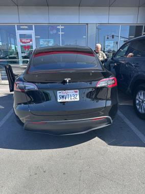 Solid Black 2024 Tesla Model Y Long Range Single Motor Rear-Wheel Drive