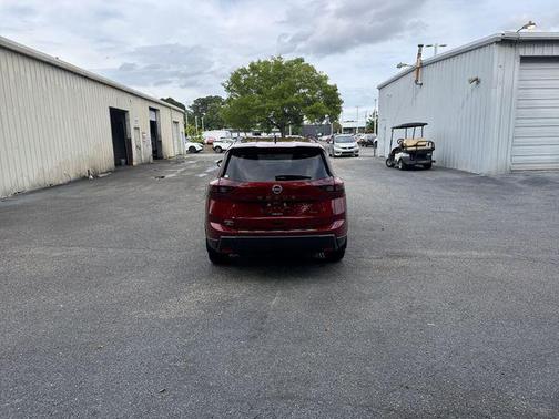 Scarlet Ember Tintcoat 2026 Nissan Rogue SV