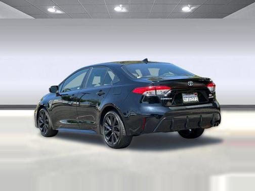 Midnight Black Metallic 2024 Toyota Corolla Hybrid LE