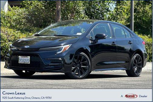 Midnight Black Metallic 2024 Toyota Corolla Hybrid LE
