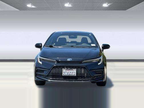 Midnight Black Metallic 2024 Toyota Corolla Hybrid LE