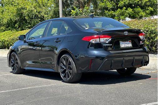 Midnight Black Metallic 2024 Toyota Corolla Hybrid LE