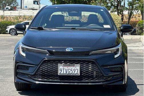 Midnight Black Metallic 2024 Toyota Corolla Hybrid LE