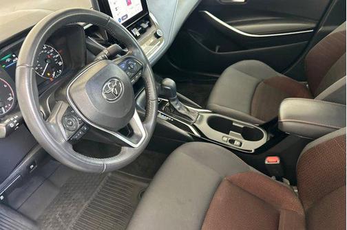 Midnight Black Metallic 2024 Toyota Corolla Hybrid LE