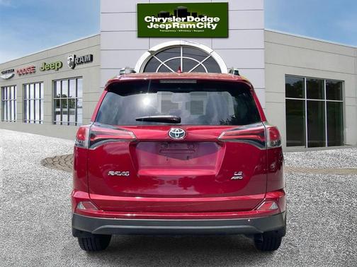 Red 2018 Toyota RAV4 LE