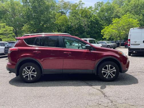 Red 2018 Toyota RAV4 LE