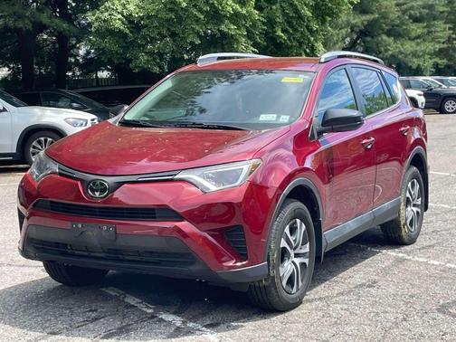Red 2018 Toyota RAV4 LE