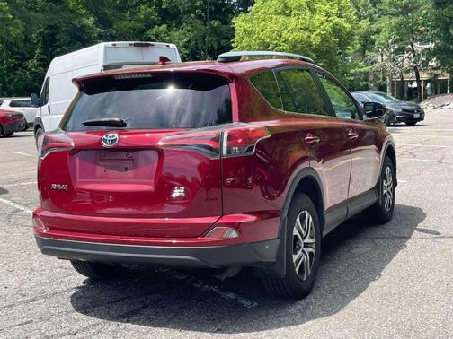 Red 2018 Toyota RAV4 LE