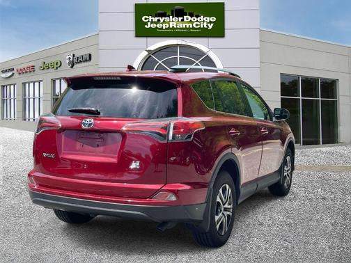 Red 2018 Toyota RAV4 LE