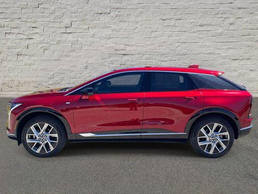 Radiant Red Tintcoat 2026 Cadillac OPTIQ Luxury