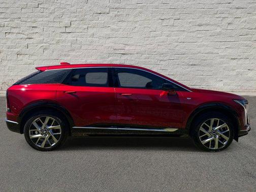 Radiant Red Tintcoat 2026 Cadillac OPTIQ Luxury