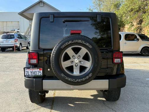 Black 2015 Jeep Wrangler Unlimited Sport