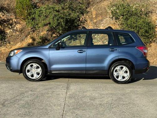 Blue 2014 Subaru Forester 2.5i