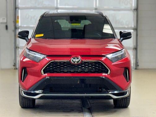 Supersonic Red/Midnight Black Metallic 2025 Toyota RAV4 Hybrid SE